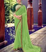 Green embroidered chiffon saree with blouse