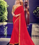 Red embroidered chiffon saree with blouse