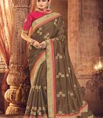chiku embroidered fancy fabric saree with blouse