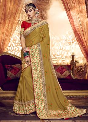 Mustard embroidered fancy fabric saree with blouse 1