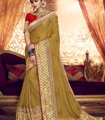 Mustard embroidered fancy fabric saree with blouse