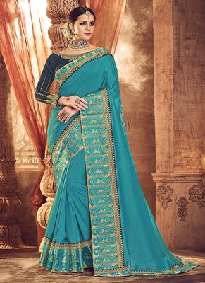   turquoise embroidered fancy fabric saree with blouse 1