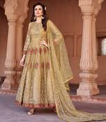 Beige embroidered net salwar
