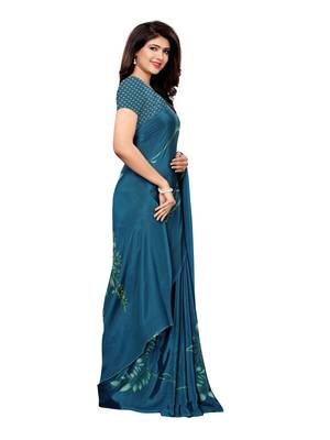 Turquoise printed crepe saree with blouse 3