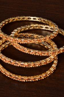 Champagne Colored Stone Embellished Two Pairs of Designer Bangles