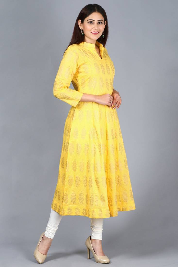 Yellow Foil Print Mughal Kurti with Off-White Churidaar