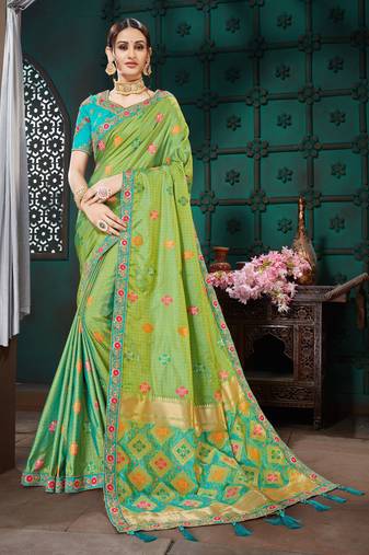 Green embroidered Banarasi Silk saree with blouse