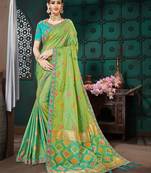 Green embroidered Banarasi Silk saree with blouse