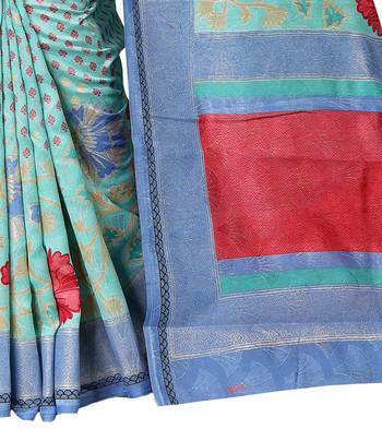Turquoise woven raw silk saree with blouse 3