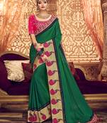 Green embroidered silk blend saree with blouse