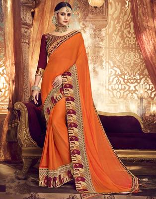 Orange embroidered silk blend saree with blouse 1