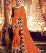 Orange embroidered silk blend saree with blouse