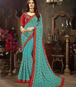 Blue embroidered georgette saree with blouse
