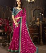 Pink embroidered georgette saree with blouse
