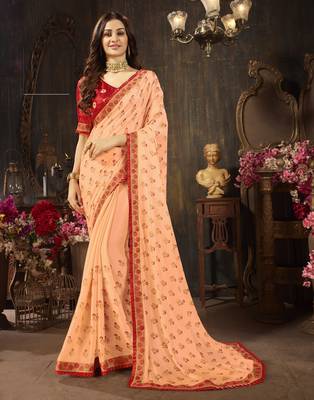 Peach embroidered georgette saree with blouse 1