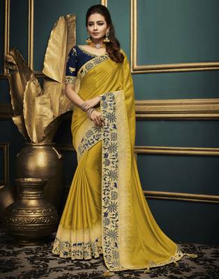 Yellow embroidered silk blend saree with blouse 1