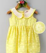Yellow printed blended cotton kids frocks
