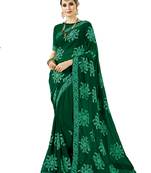 Dark green embroidered georgette saree with blouse