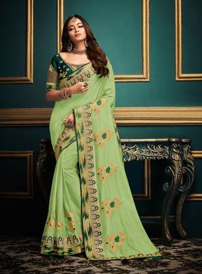 Light green embroidered satin saree with blouse 1