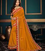 Mustard embroidered silk saree with blouse