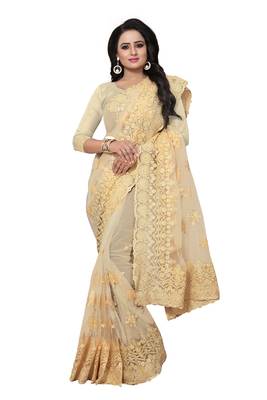 Beige embroidered net saree with blouse 2