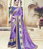 Purple embroidered silk blend saree with blouse