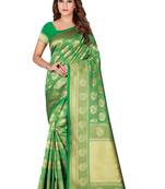 Green woven banarasi silk saree with blouse