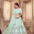 Turquoise Sequins, Pearl & Zari Embroidered Silk Semi Stitched bridal lehenga