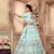 Turquoise Sequins, Pearl & Zari Embroidered Silk Semi Stitched bridal lehenga