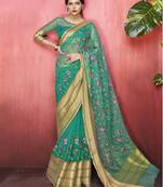 Green embroidered organza saree with blouse