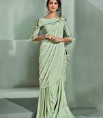  light green embroidered lycra saree with blouse