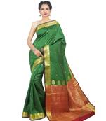 Green woven Banarasi Saree with blouse