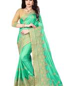 Green embroidered silk saree with blouse