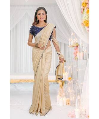 beige embroidered art silk saree with blouse 1