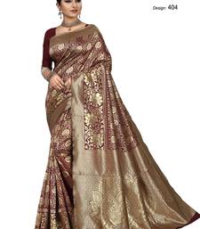 Red embroidered banarasi silk saree with blouse