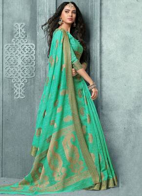 Turquoise woven faux jute saree with blouse 2