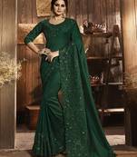   dark green embroidered silk saree with blouse