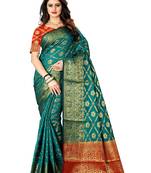 Green woven banarasi silk saree with blouse