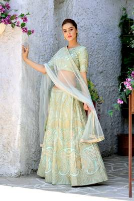 Green embroidered silk semi stitched lehenga 3