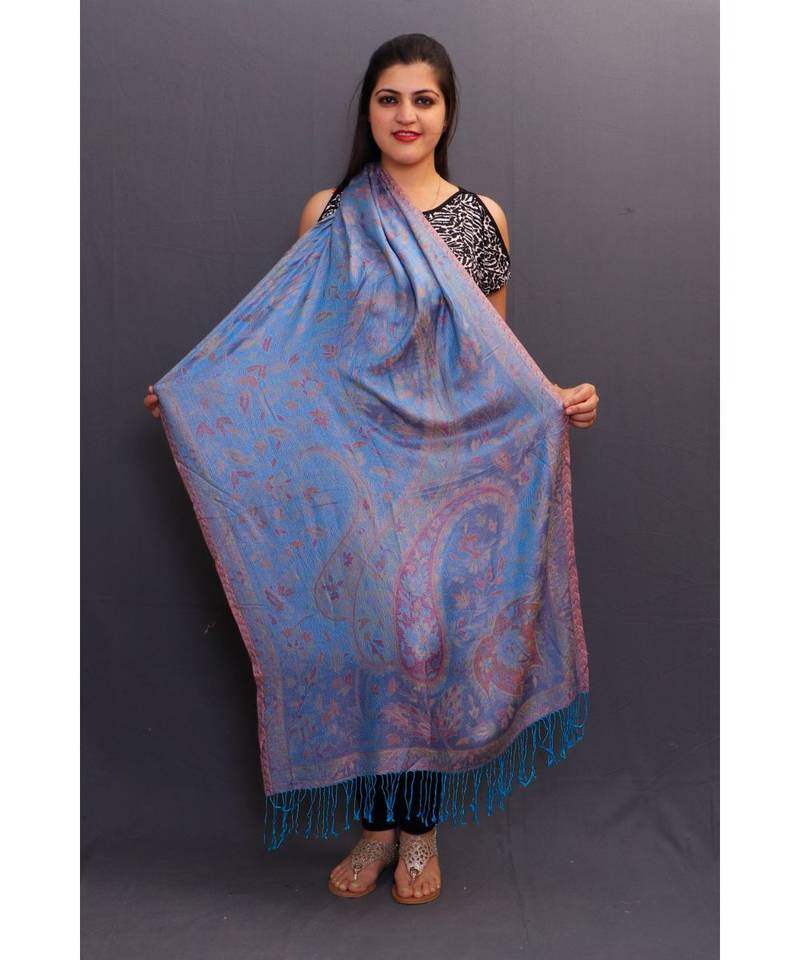 Delicate Wrap Along With Sky Blue Colour Base And Paisley Pattern On Stole Looks Elegant.