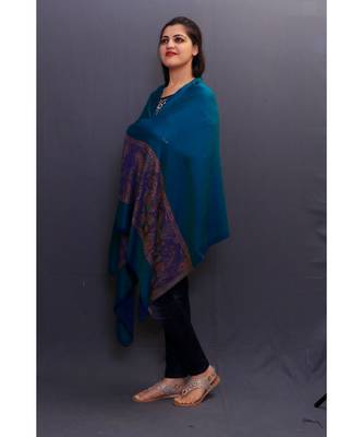 Reversible Delicate Wrap Along With Royal Blue Base And Highly Defined Border Gains Whole Attention. 1