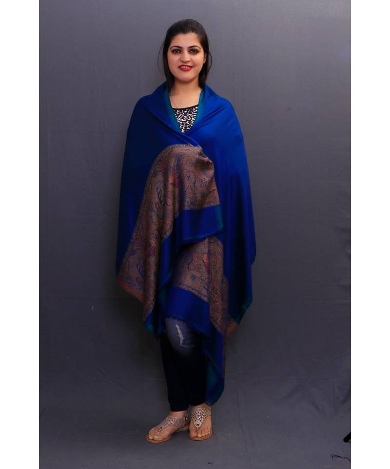 Reversible Delicate Wrap Along With Royal Blue Base And Highly Defined Border Gains Whole Attention.