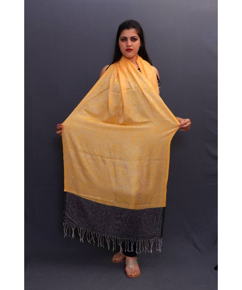 Delicate Wrap Along With Yellow Base And Highly Defined Broad Border Gains Whole Attention.