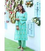 turquoise printed cotton stitched kurti sets