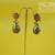 Ruby Handpainted peacock motif kundan jhumka earrings