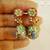Ruby Handpainted peacock motif kundan jhumka earrings