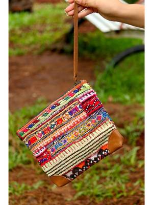 Multicolored 
    Leather pattern
    Zip Purse
    Colorful hand embroidered
    Length -8 Inches
    Width-10 Inches 1