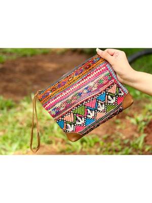 Multicolored 
    Leather pattern
    Zip Purse
    Colorful hand embroidered
    Length -8 Inches
    Width-10 Inches 2