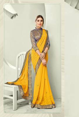 Yellow embroidered pure chiffon saree with blouse 1