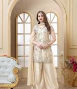 Off White embroidered net sharara Suit
